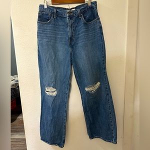 High Waisted Straight Blue Jeans by Levi. Size 31.